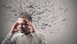 Man receiving projected thoughts from demonic entities.